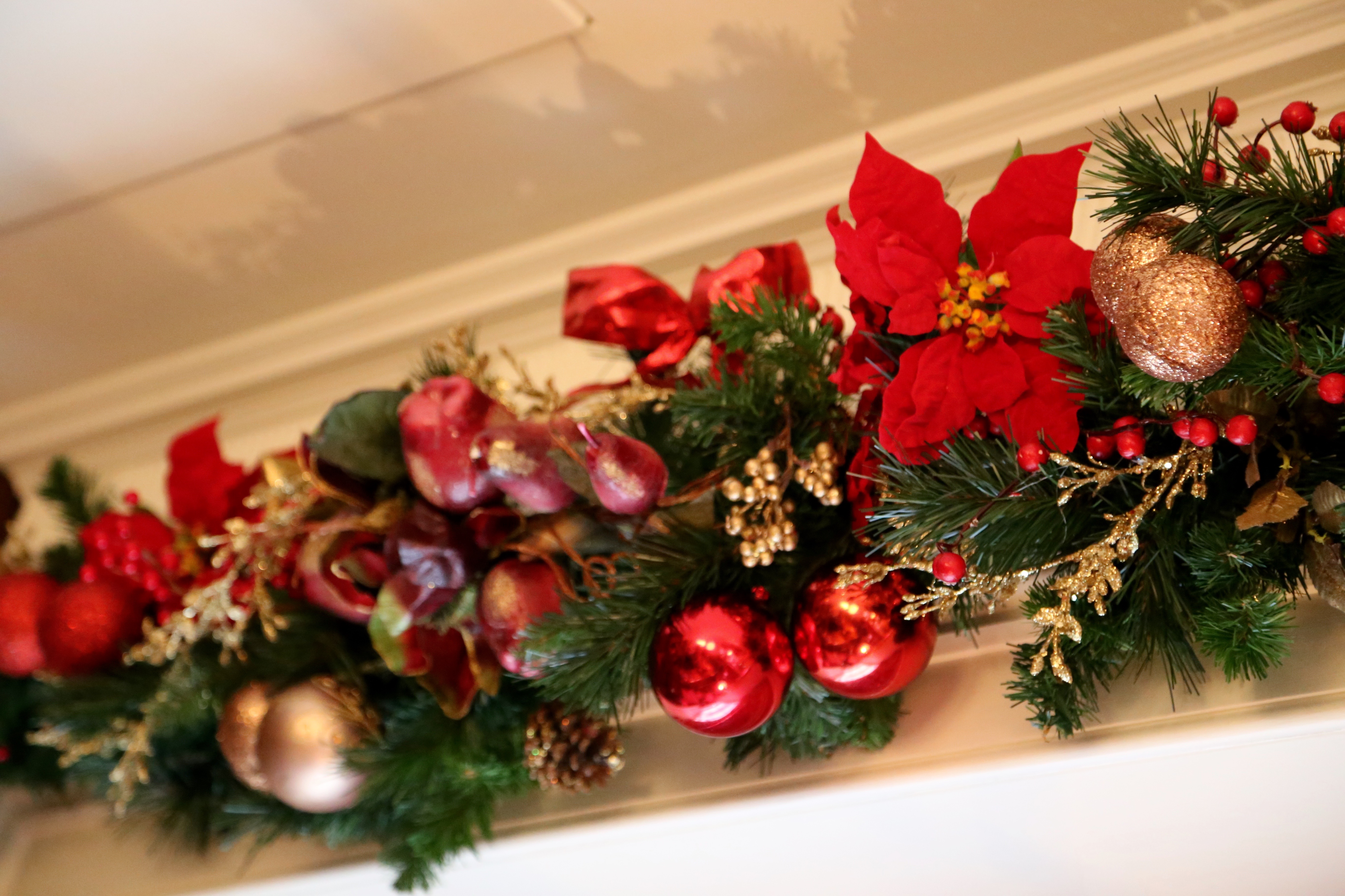 Christmas installation with lights and winter foliage
