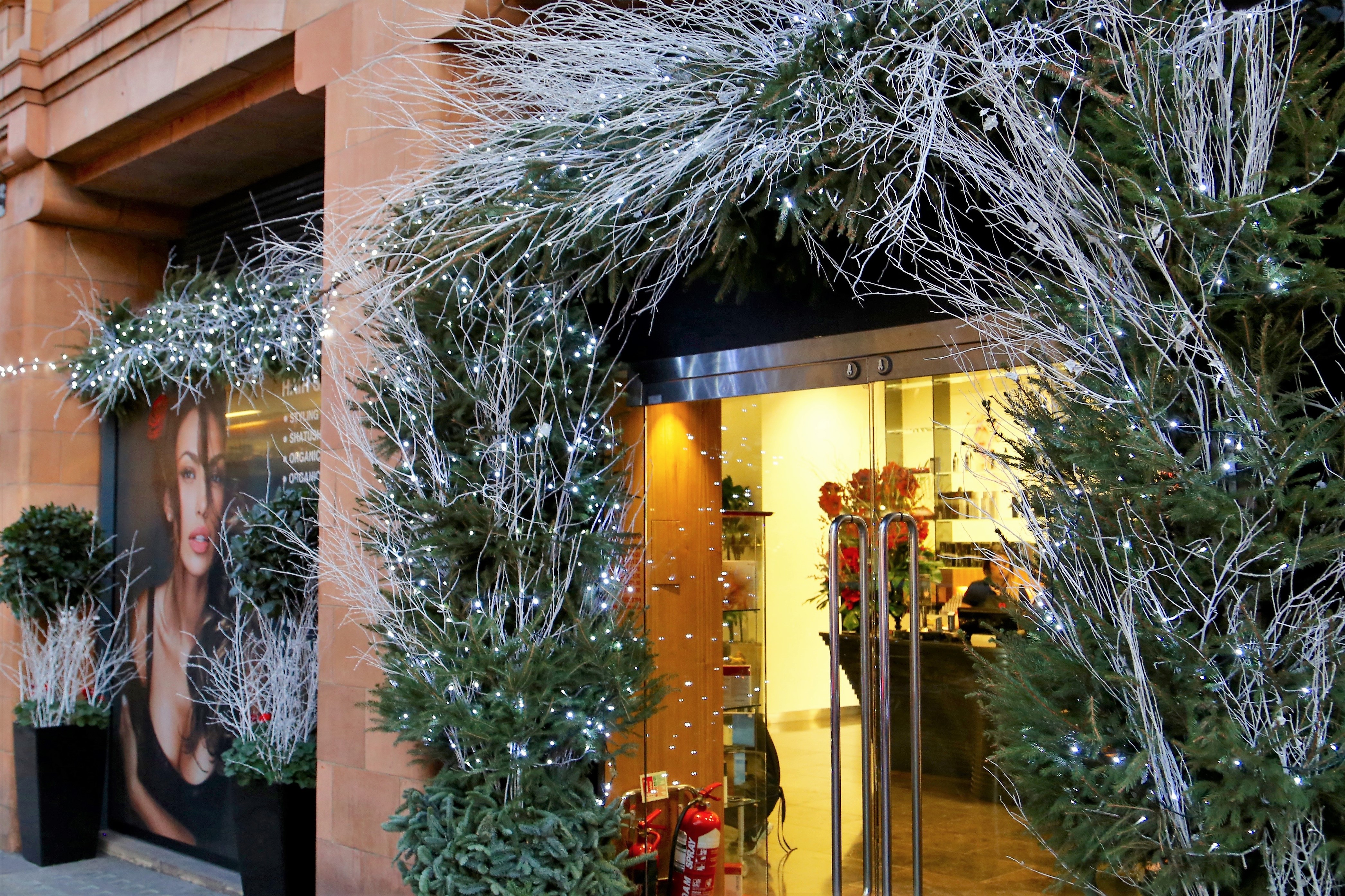 Christmas floral arrangement with winter branches and seasonal texture