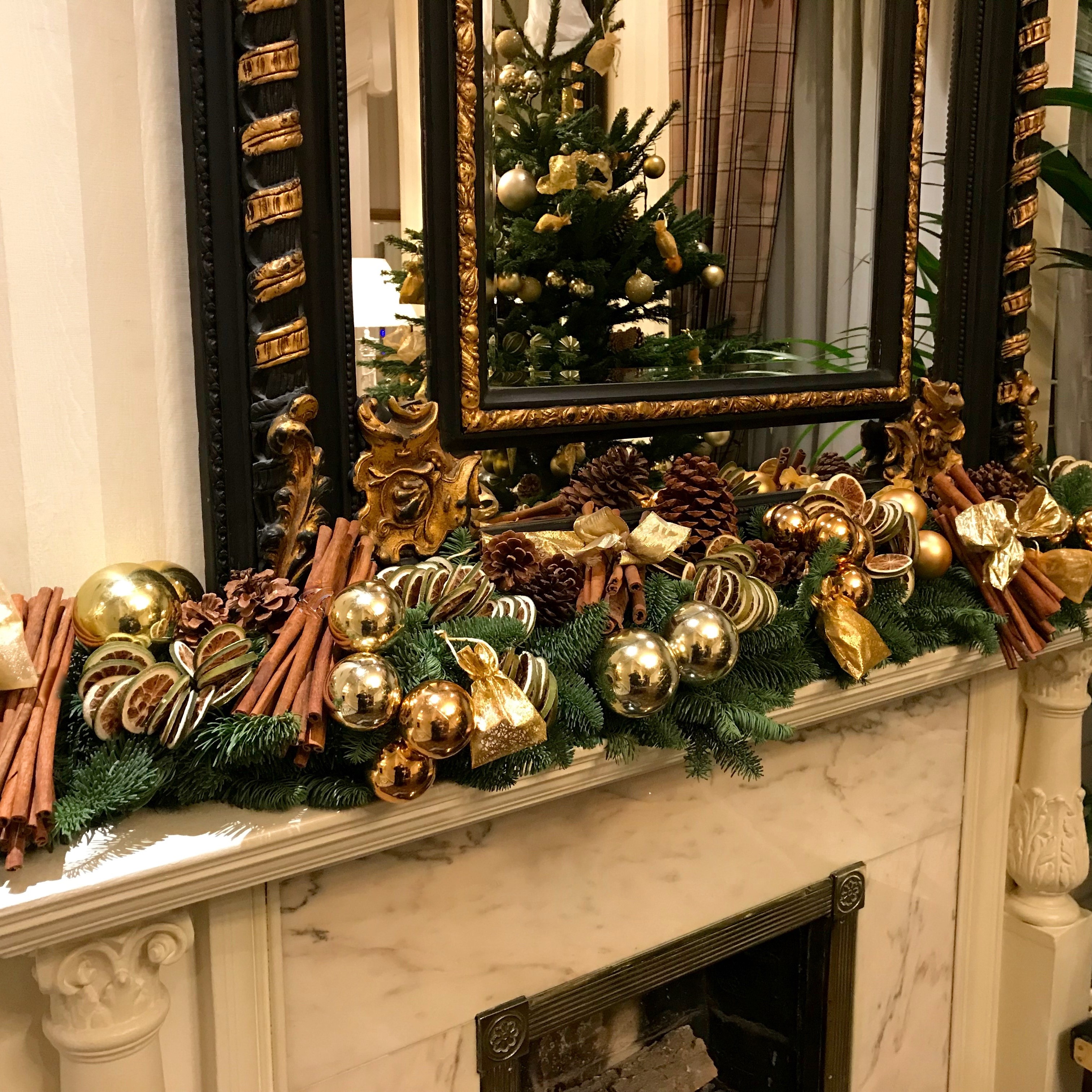 Round Christmas flowers arranged with festive foliage