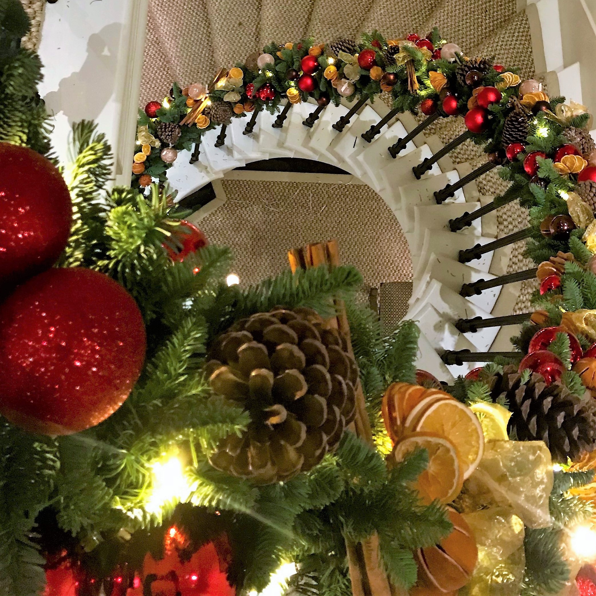 Festive Christmas floral centrepiece in rich tones