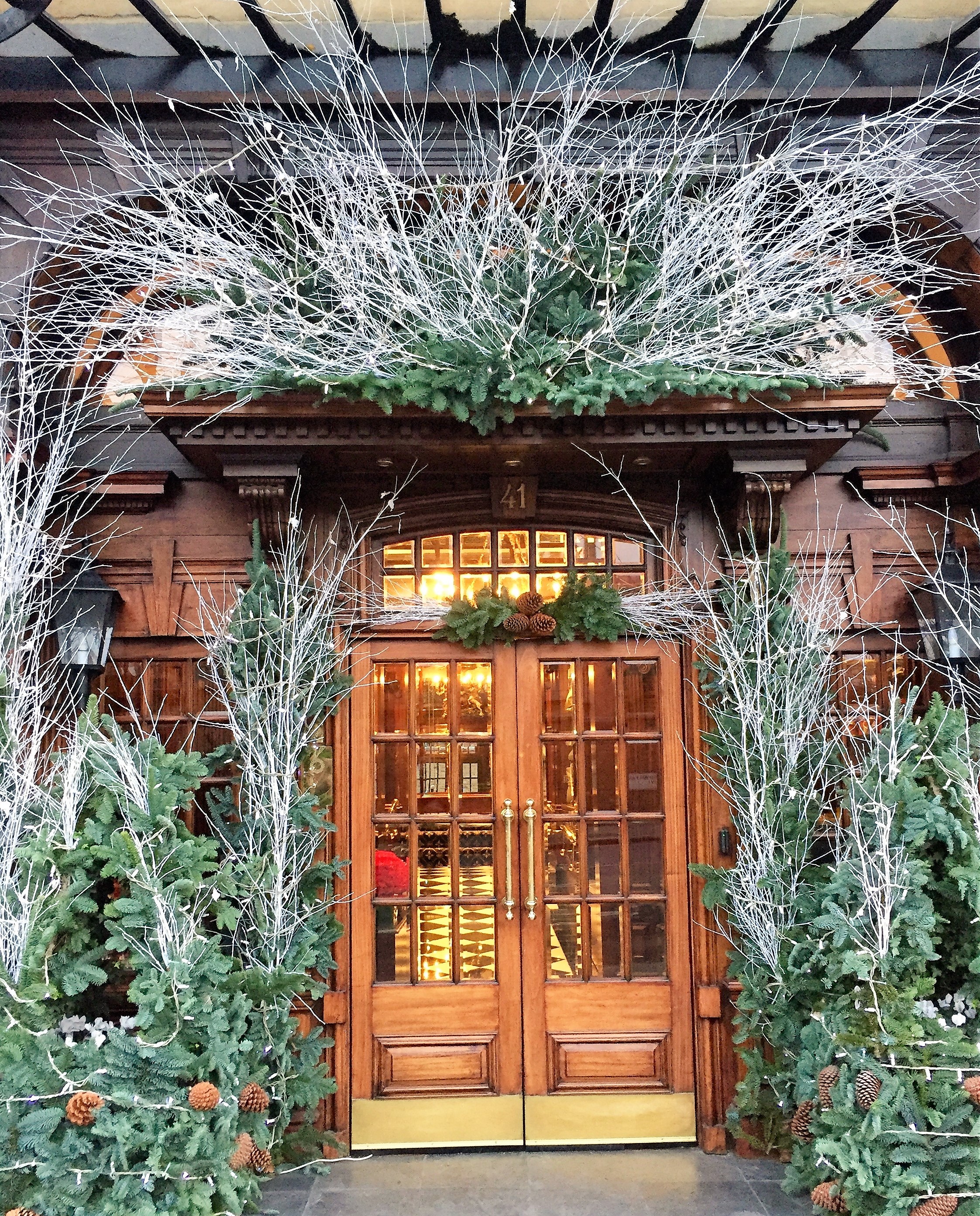 Tall Christmas installation with natural winter materials