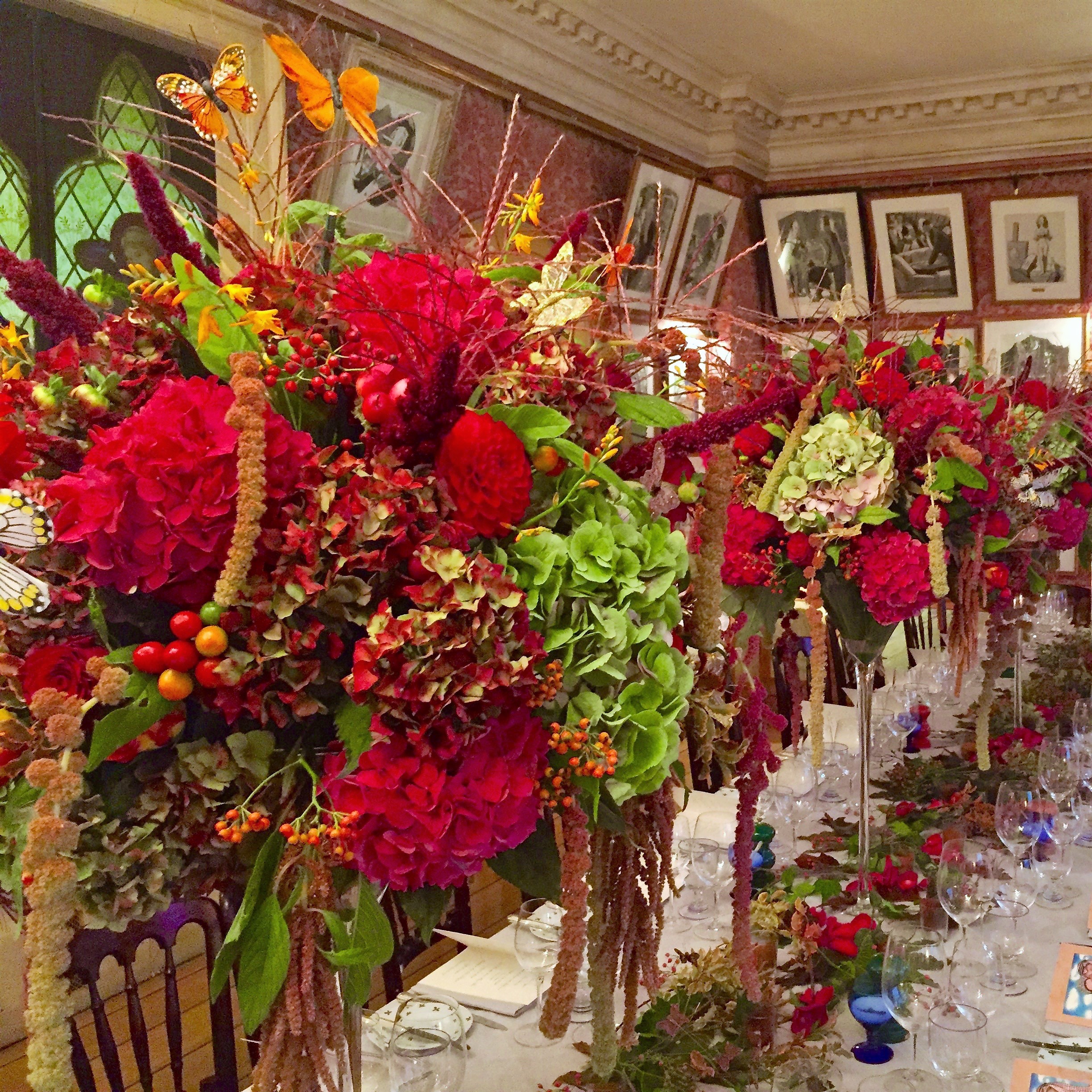 Venue flowers arranged with high-impact colour