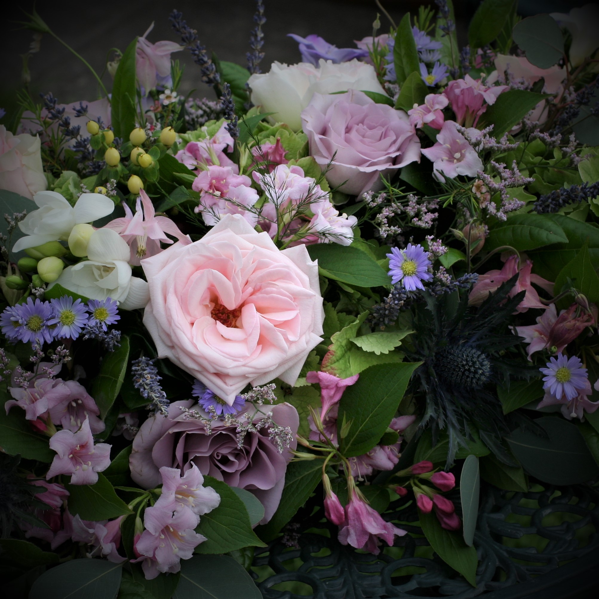 Fresh flowers arranged in a square display for an interior