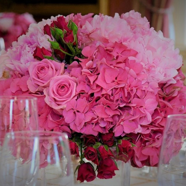 Fresh home flowers arranged in a compact square composition