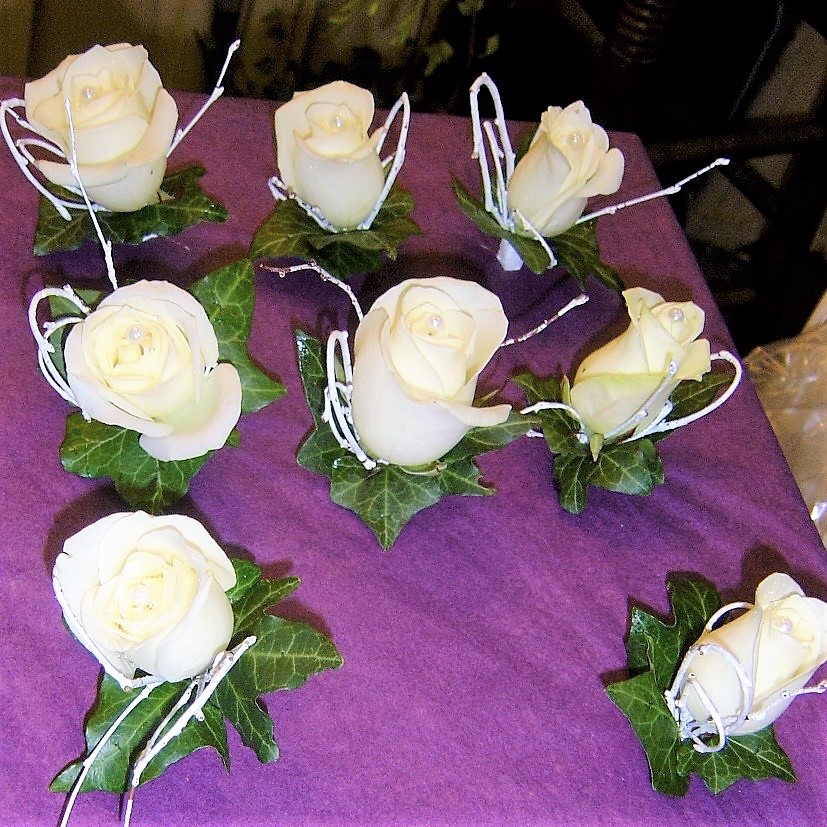 Wedding floral design in soft cream and green tones