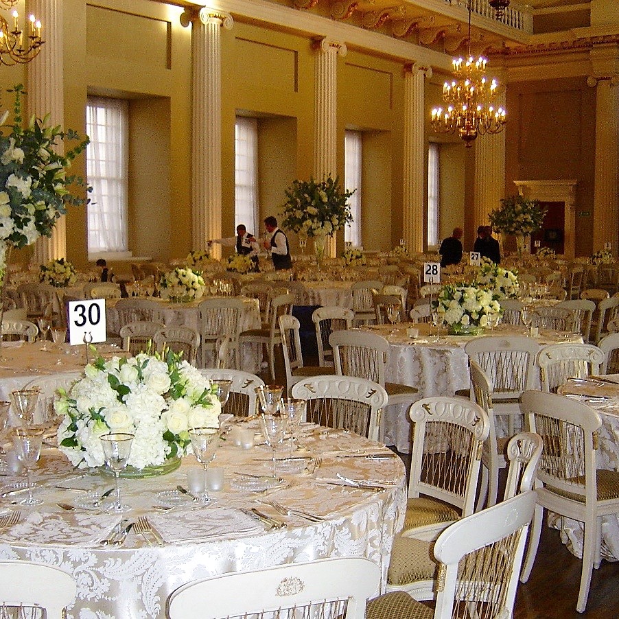Wedding flowers arranged with white blooms and greenery